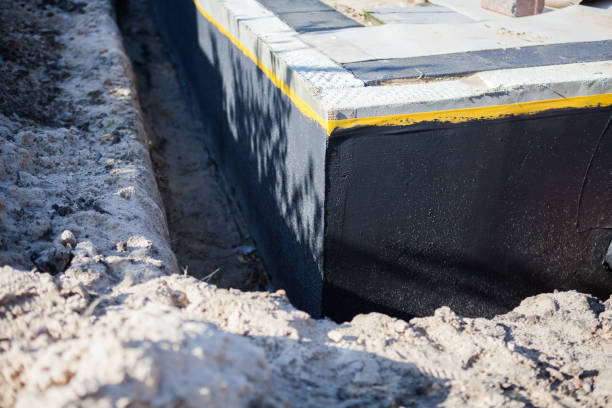 Professional Interior Drainage System technician working in Manville, NJ
